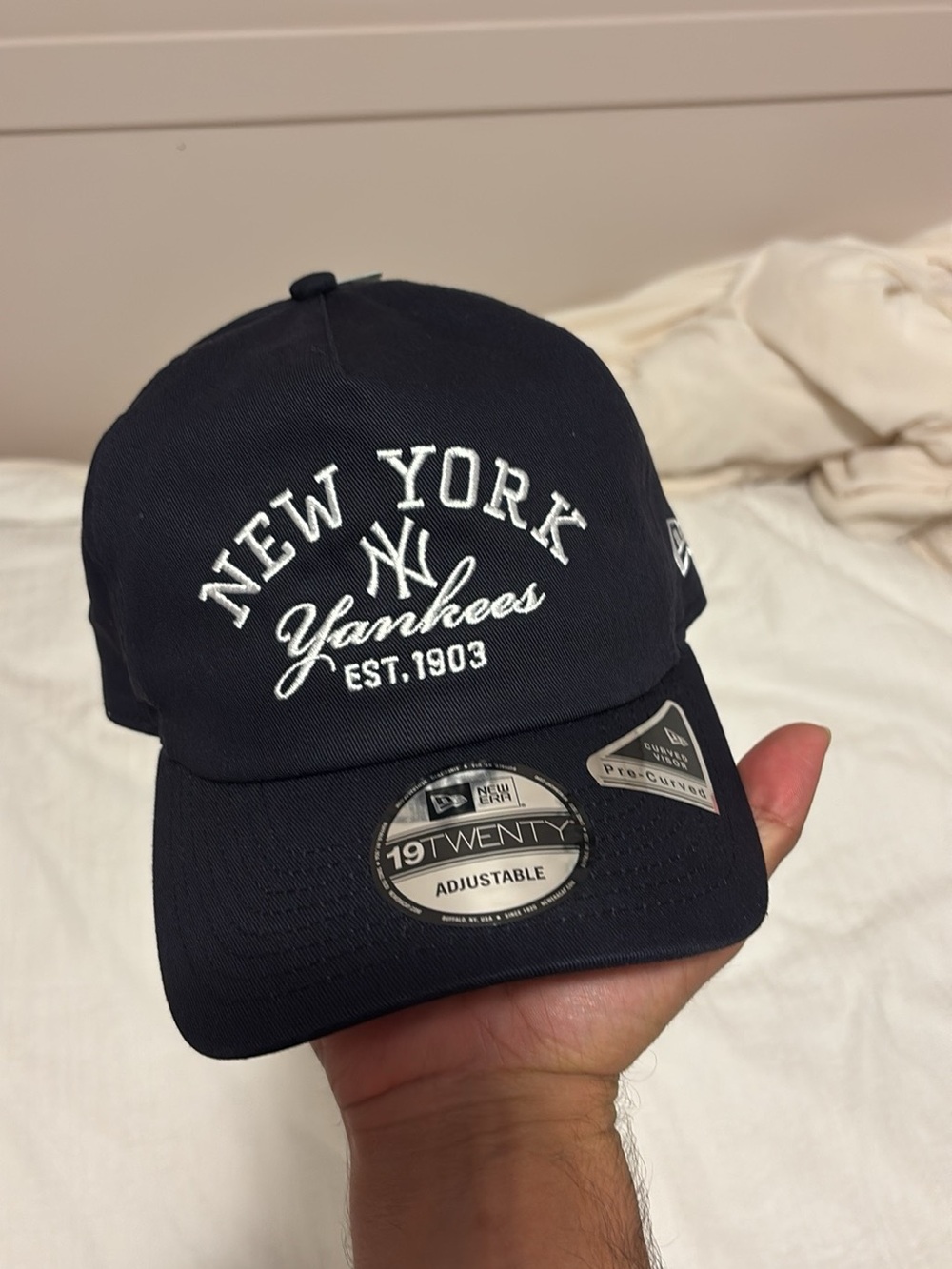 New Era Navy New York Yankees Curved Brim Cap with White Embroidery